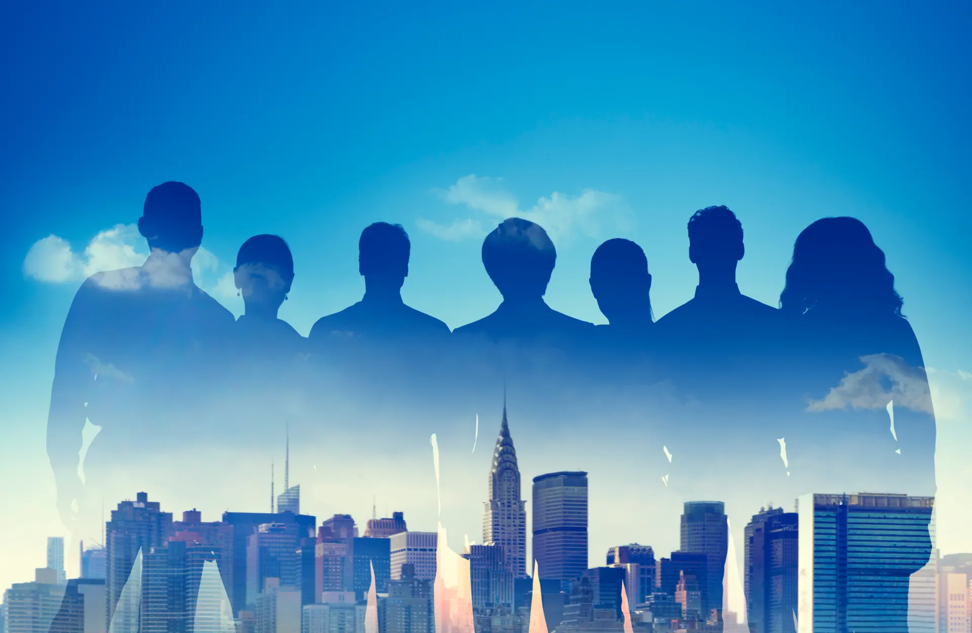 Our team silhouette against city skyline