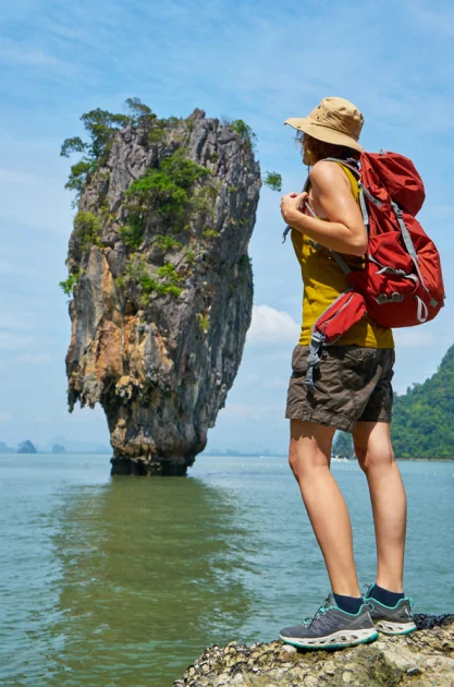 Woman exploring tropical beach